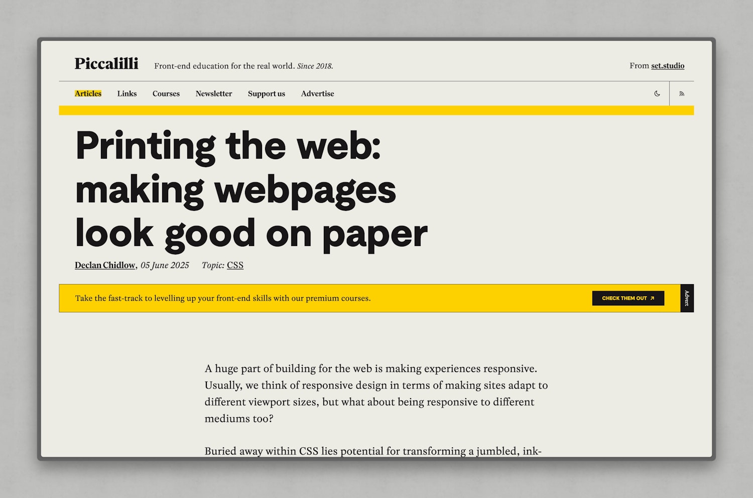 The hero is much simpler: just a headline and because of that, the now yellow advertising banner is much easier to see. The article is now in a reasonably narrow, center-aligned container.