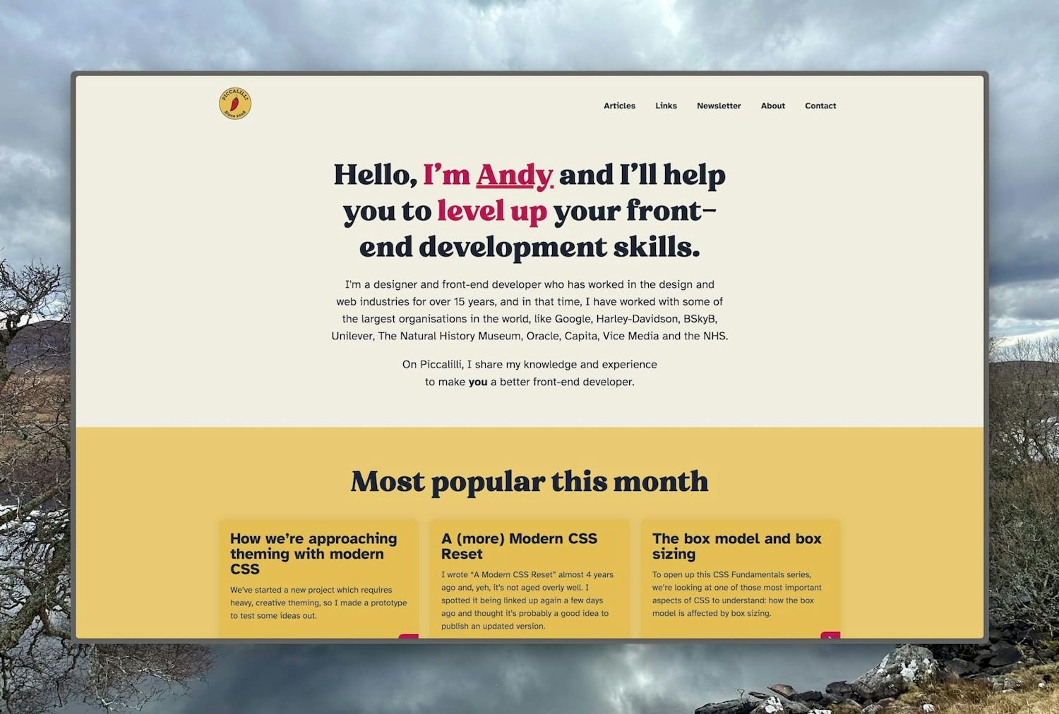 The Piccalilli homepage with a eggshell, yellow and cardinal pink colour palette, featuring the old chilli pepper brand