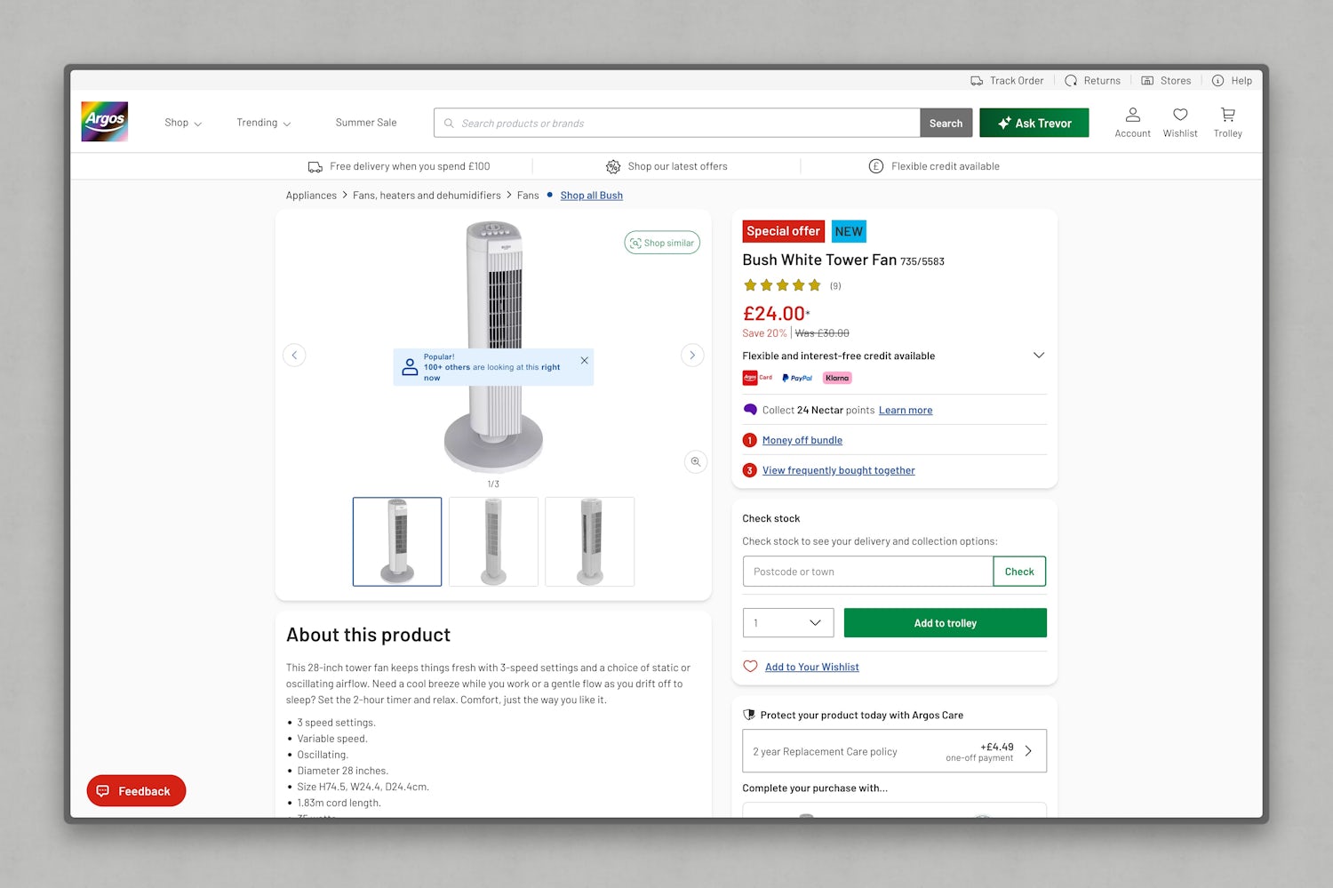 A product page on the Argos website for a “Bush White Tower Fan” priced at £24.00, showing a 28-inch white oscillating fan with a circular base. A blue overlay box on the product image reads “Popular! 100+ others are looking at this right now,” leveraging real-time social proof to suggest high demand. The fan is listed as a special offer, with 20% off the original price of £30.00. The product has 9 reviews and a 4.5-star rating. Purchase options, stock checker, and bundle promotions are visible alongside the “Add to trolley” button.